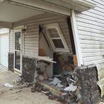 car crash into house ri