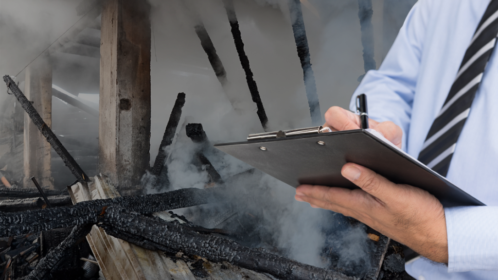 public adjuster assessing fire damage to a building in rhode island